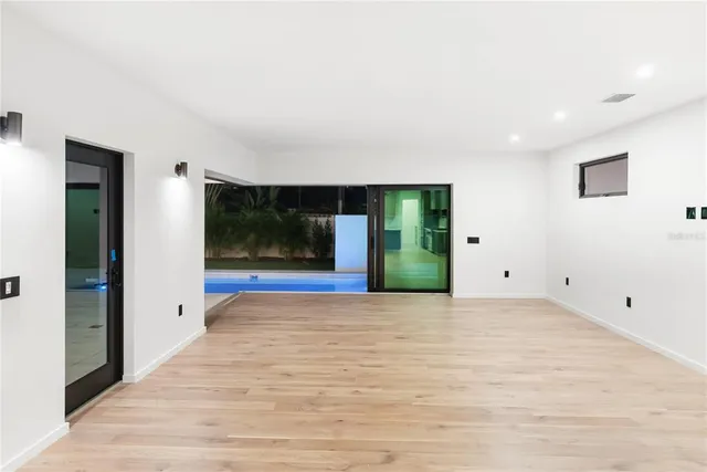 a view of entryway with wooden floor