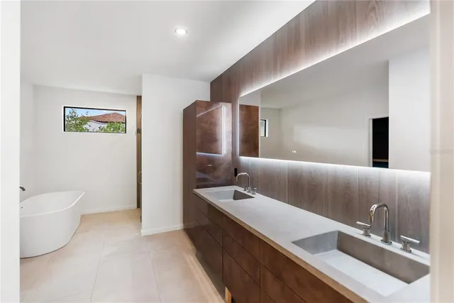 a potted plant sitting on the side of a brick building