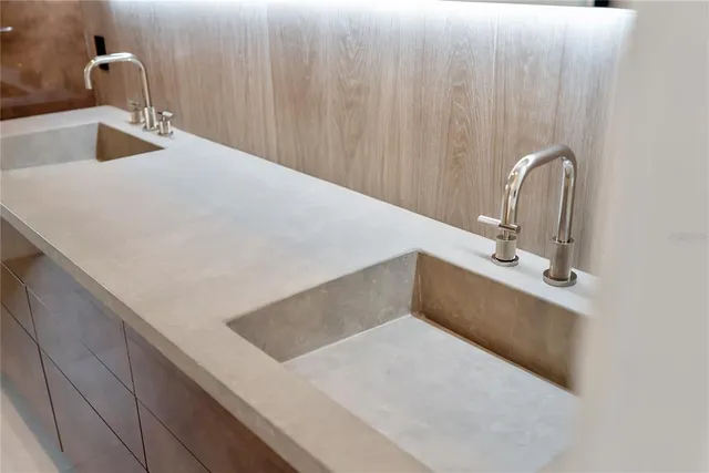 an aerial view of multiple houses with yard