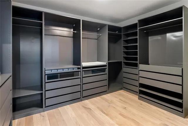 an aerial view of multiple houses with outdoor space