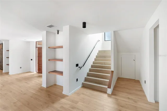 an aerial view of a city with lots of residential buildings