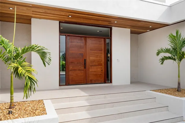 a kitchen with a table and chairs in it