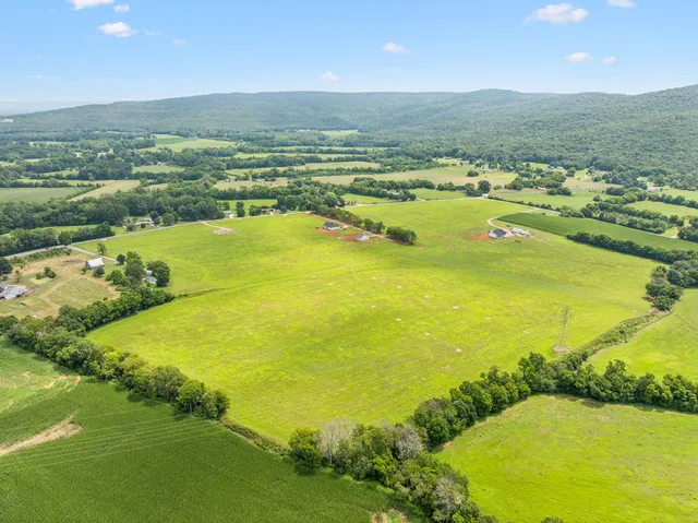 a view of an ocean and a yard