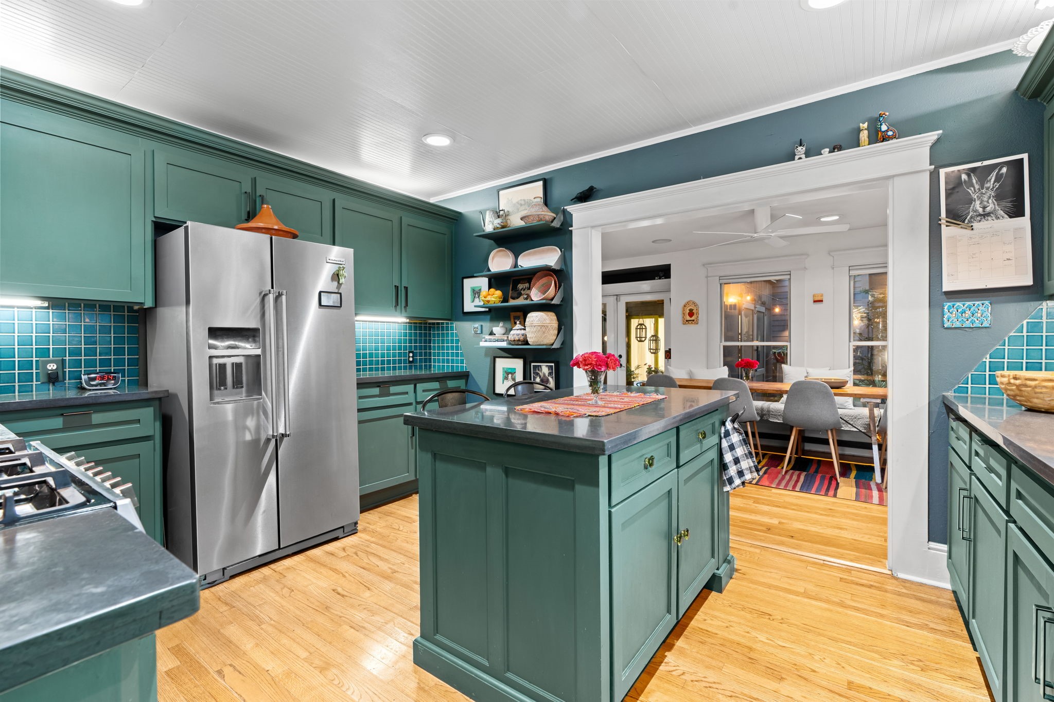 802 Ralfallen Street Houston, TX 77008 - Photo 18 of 45 a kitchen with stainless steel appliances granite countertop a refrigerator and a stove