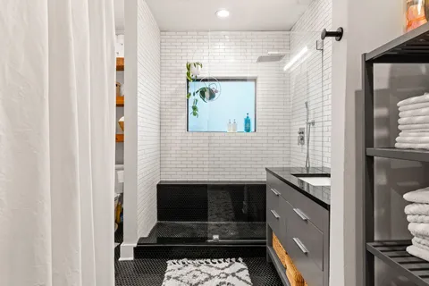 a kitchen with a sink and a stove