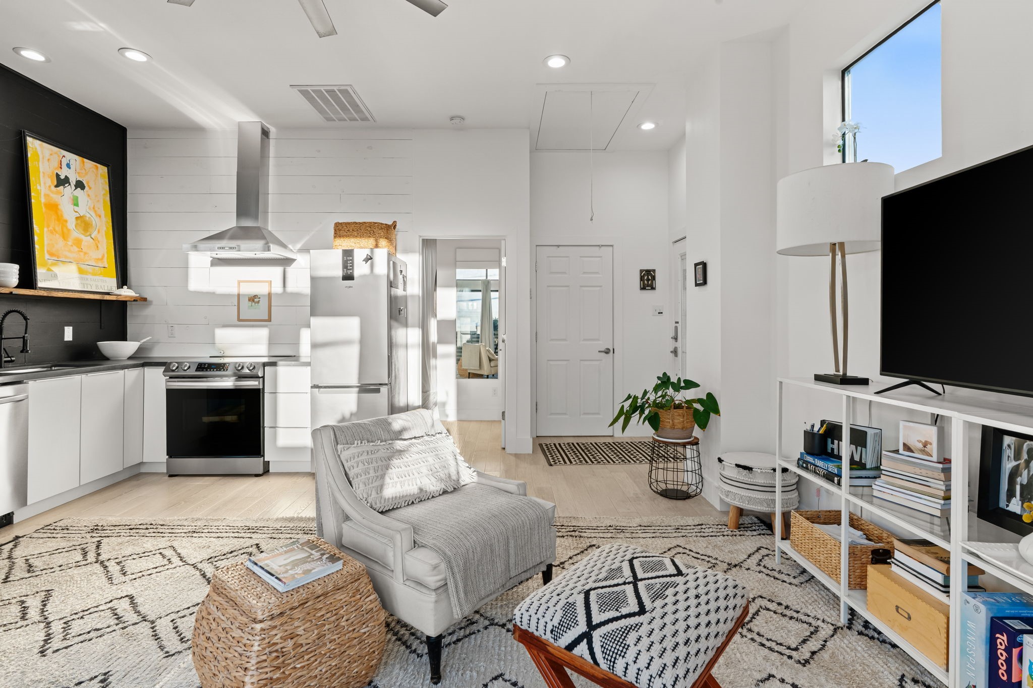 802 Ralfallen Street Houston, TX 77008 - Photo 37 of 45 a living room with furniture and a flat screen tv