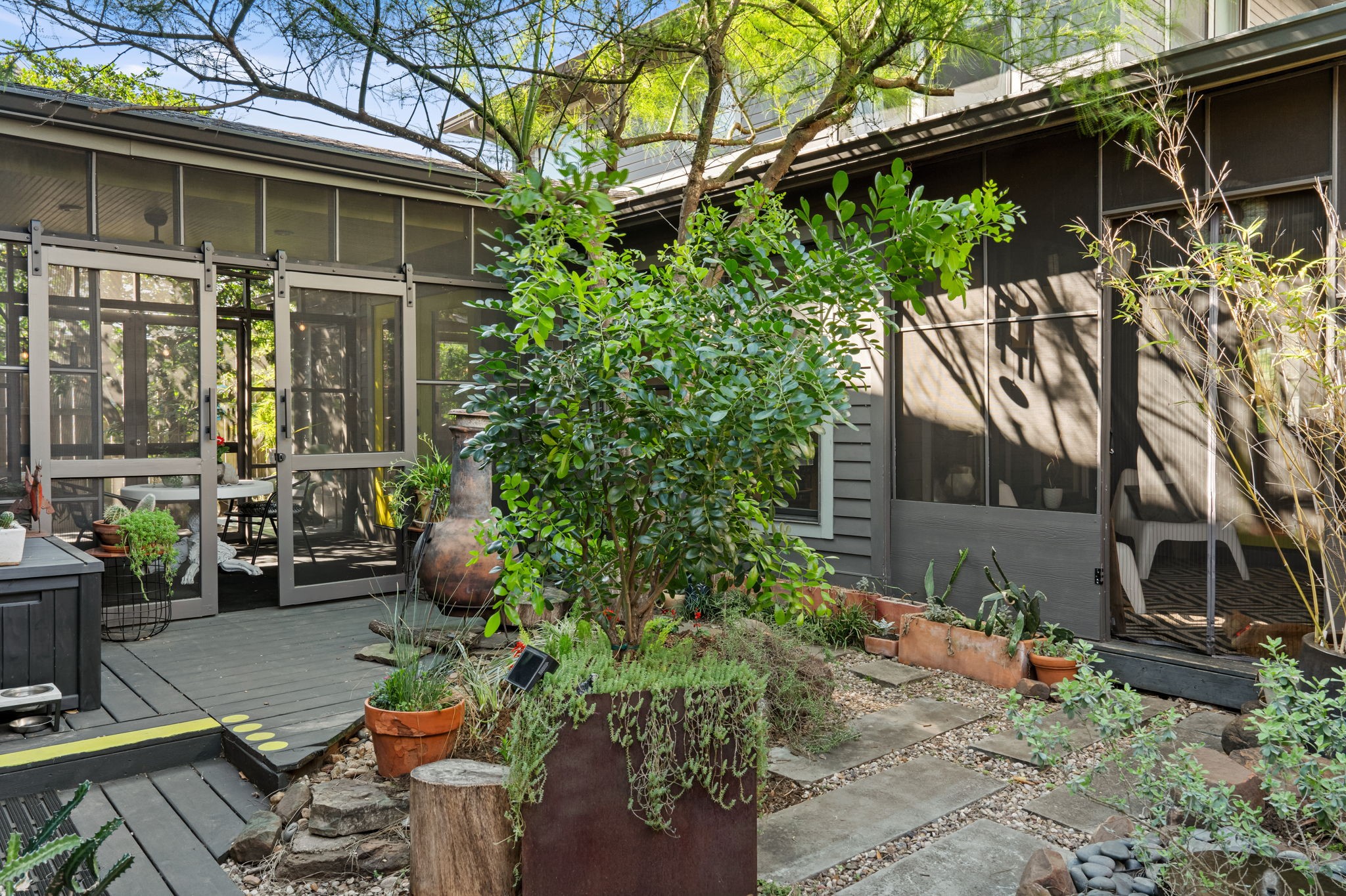 802 Ralfallen Street Houston, TX 77008 - Photo 40 of 45 a backyard of a house with outdoor seating
