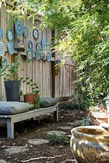 a outdoor living space with furniture and flowers