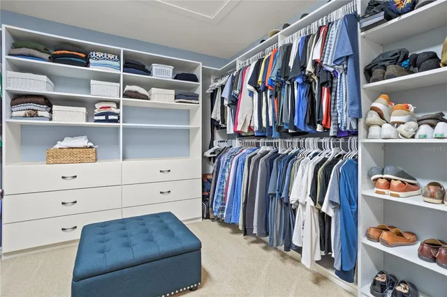 a view of a chair and table in the garden