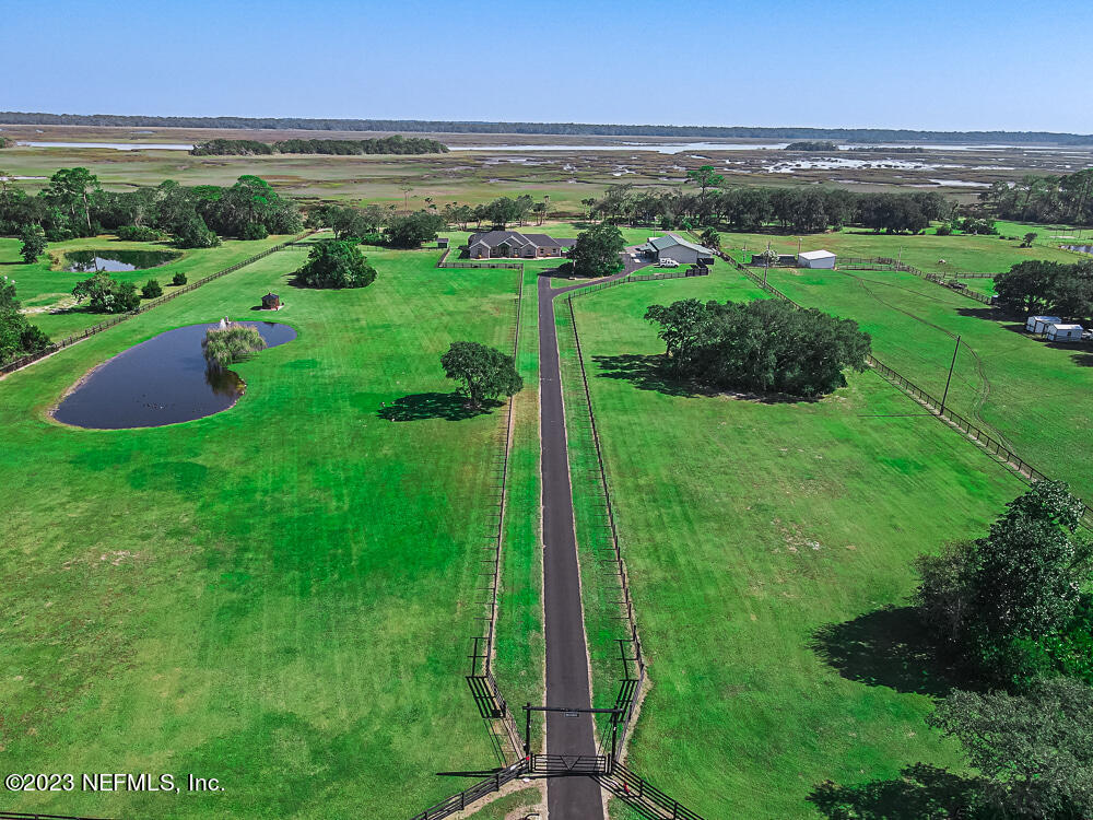 a view of a city with lush green forest