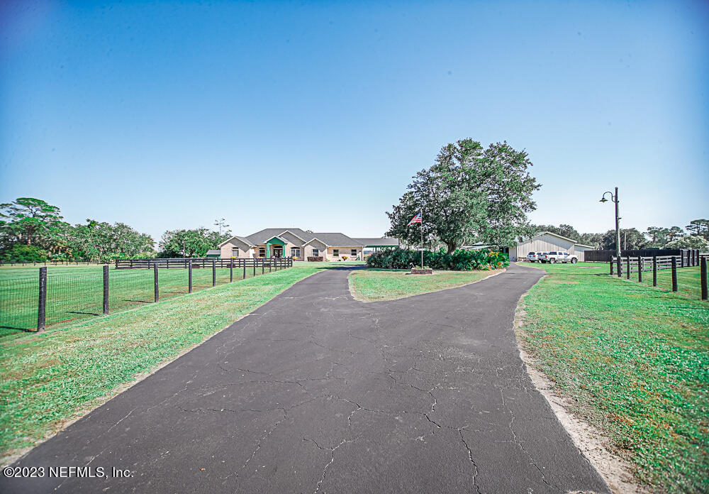 12625 Sawpit Road Jacksonville, FL 32226 - Photo 11 of 63 a view of a park with large trees and plants
