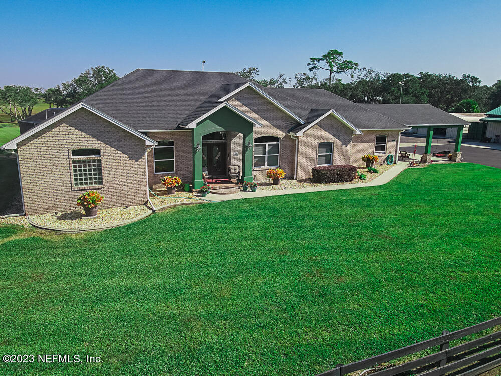 12625 Sawpit Road Jacksonville, FL 32226 - Photo 13 of 63 a front view of house with yard and green space