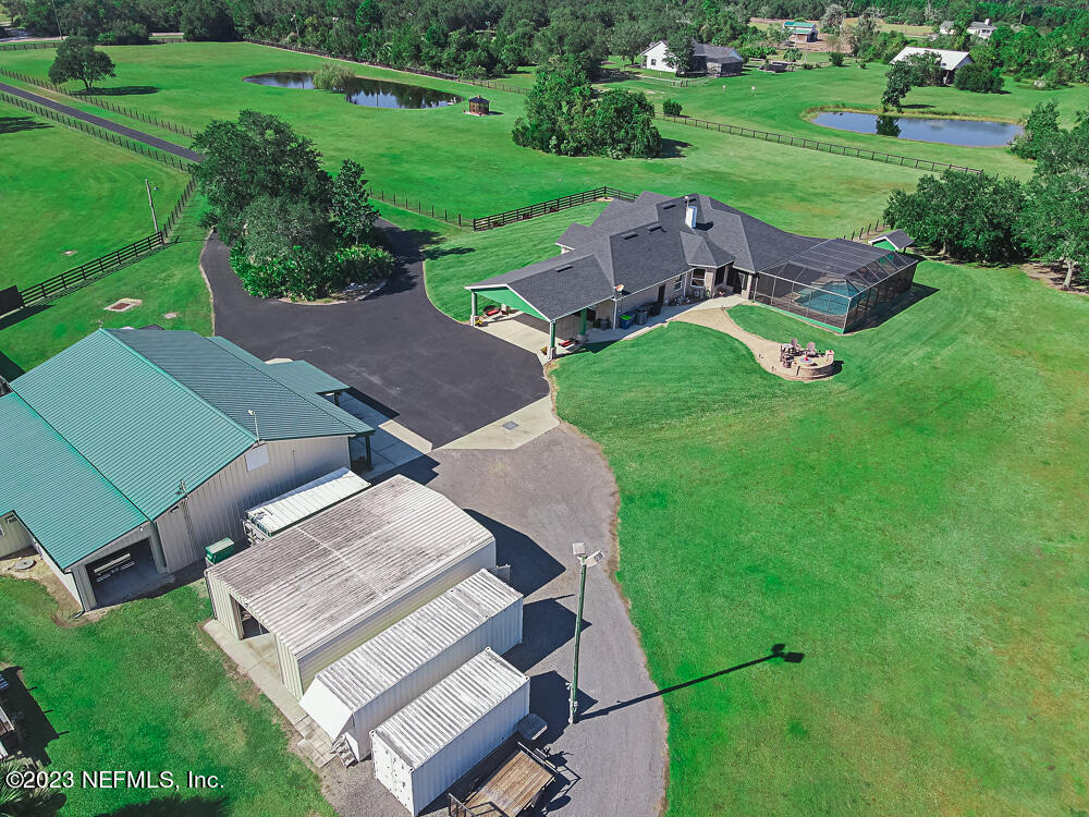 12625 Sawpit Road Jacksonville, FL 32226 - Photo 17 of 63 an aerial view of a house with garden space and street view