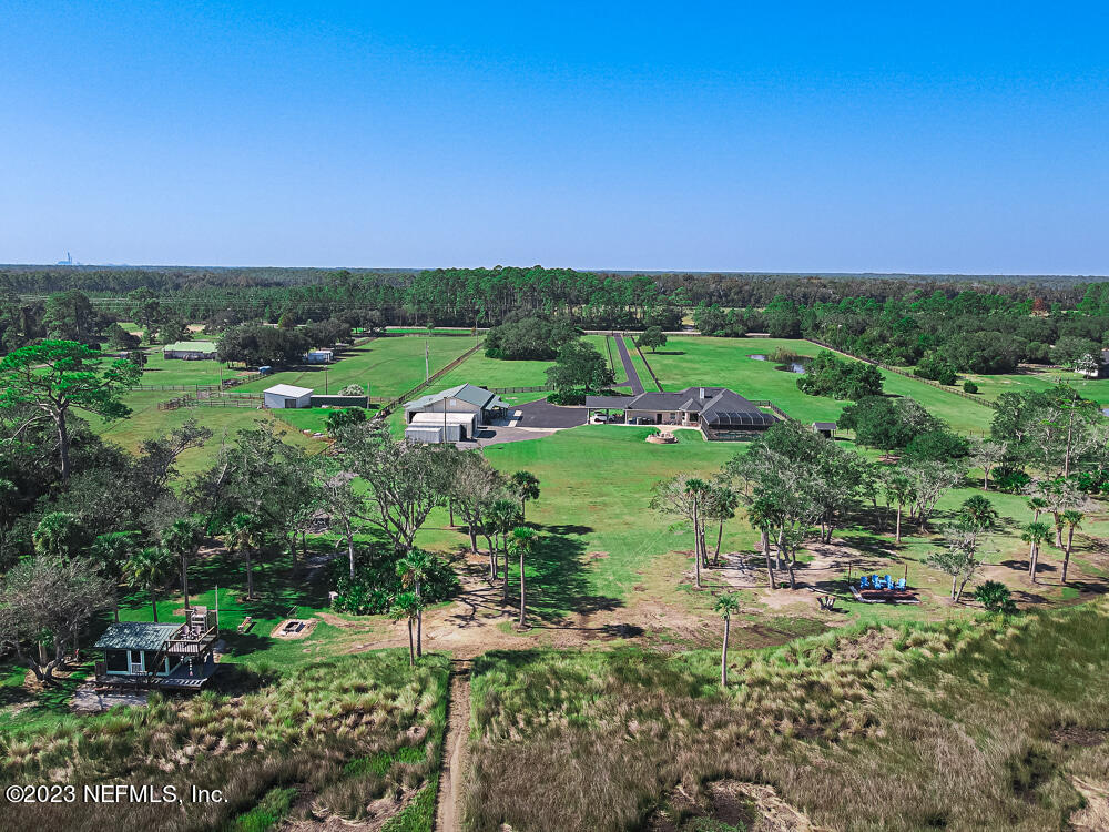 12625 Sawpit Road Jacksonville, FL 32226 - Photo 2 of 63 a view of a garden with houses