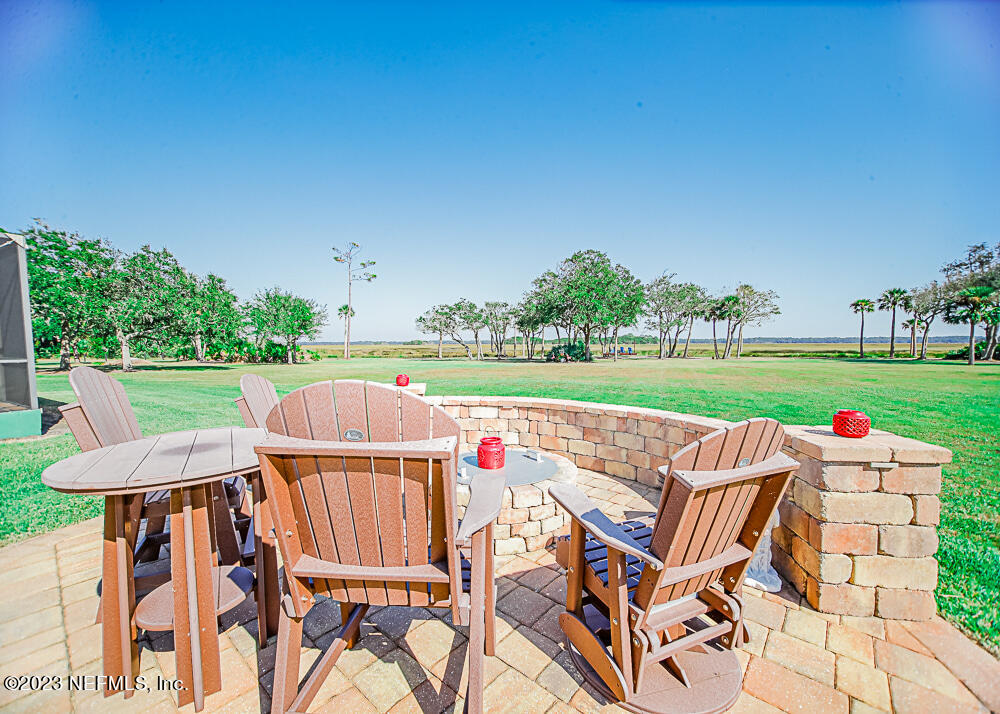 12625 Sawpit Road Jacksonville, FL 32226 - Photo 24 of 63 a view of an outdoor sitting area with furniture and garden