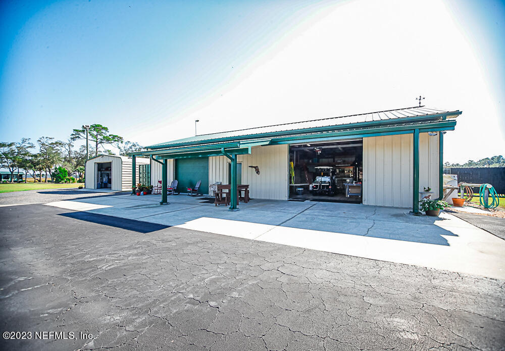 12625 Sawpit Road Jacksonville, FL 32226 - Photo 28 of 63 a view of a house with sitting area and chandelier