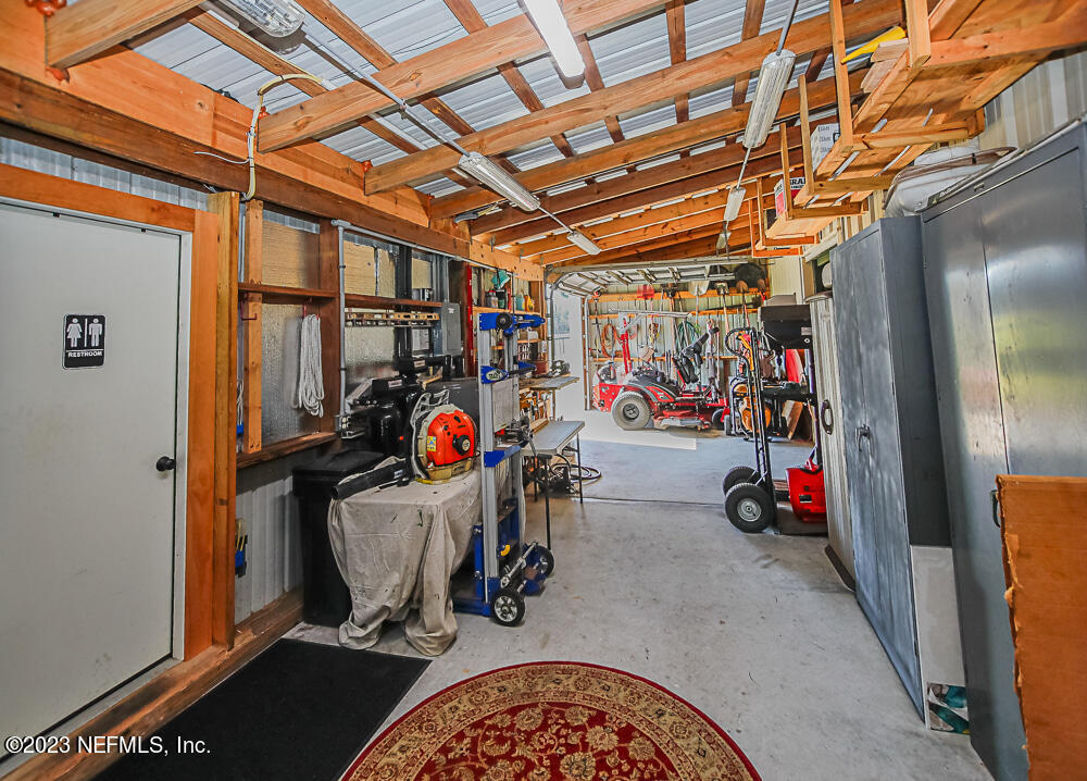 12625 Sawpit Road Jacksonville, FL 32226 - Photo 34 of 63 a view of a storage room with a lot of stuff