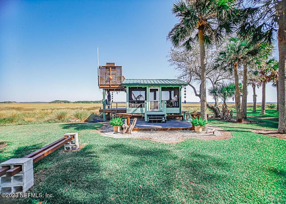 12625 Sawpit Road Jacksonville, FL 32226 - Photo 36 of 63 an outdoor space with furniture and lake view