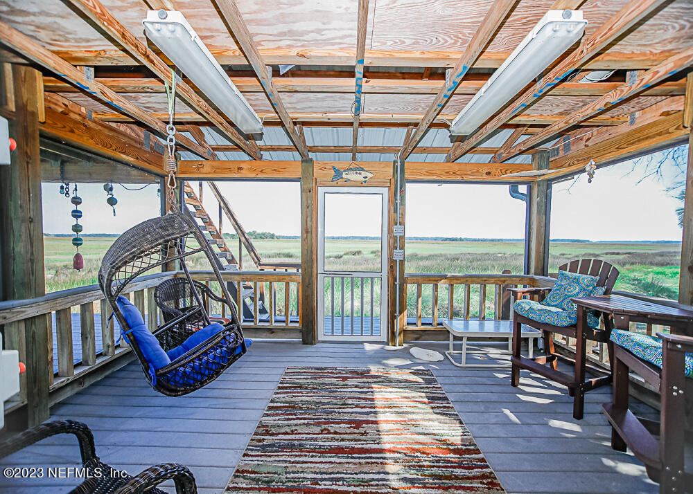 12625 Sawpit Road Jacksonville, FL 32226 - Photo 40 of 63 a view of a patio with wooden floor