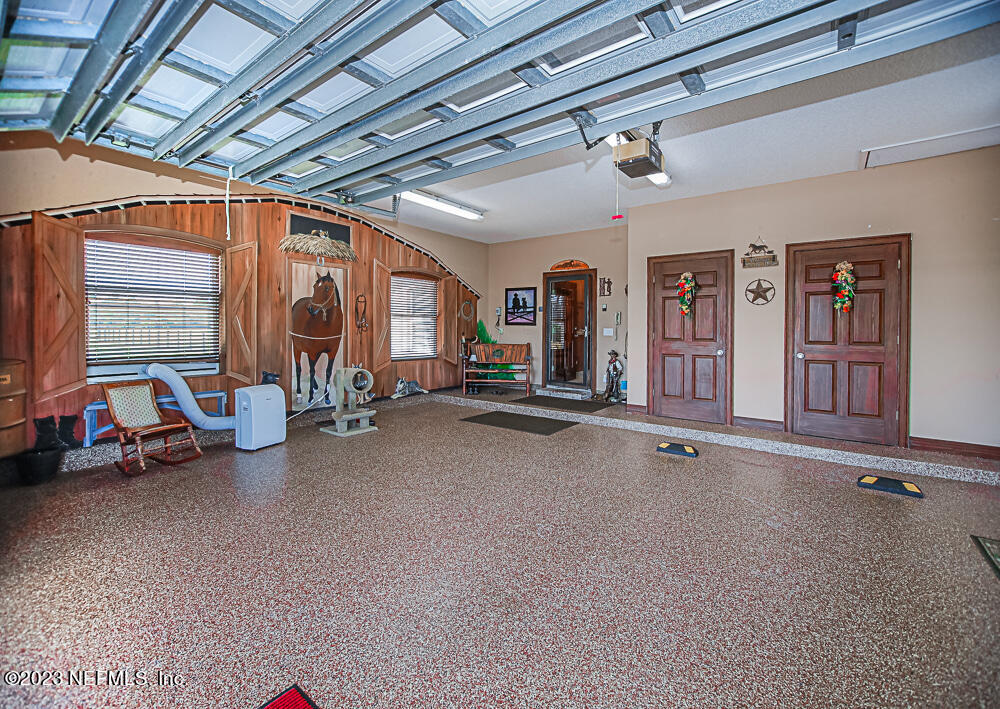 12625 Sawpit Road Jacksonville, FL 32226 - Photo 44 of 63 a view of a room with gym equipment