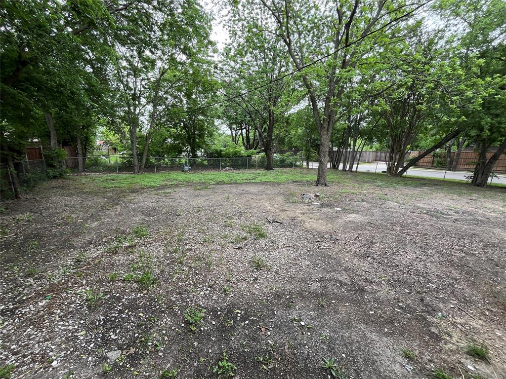 2706 Gross Road Dallas, TX 75228 - Photo 19 of 23 Expansive lot featuring mature trees and partial fencing