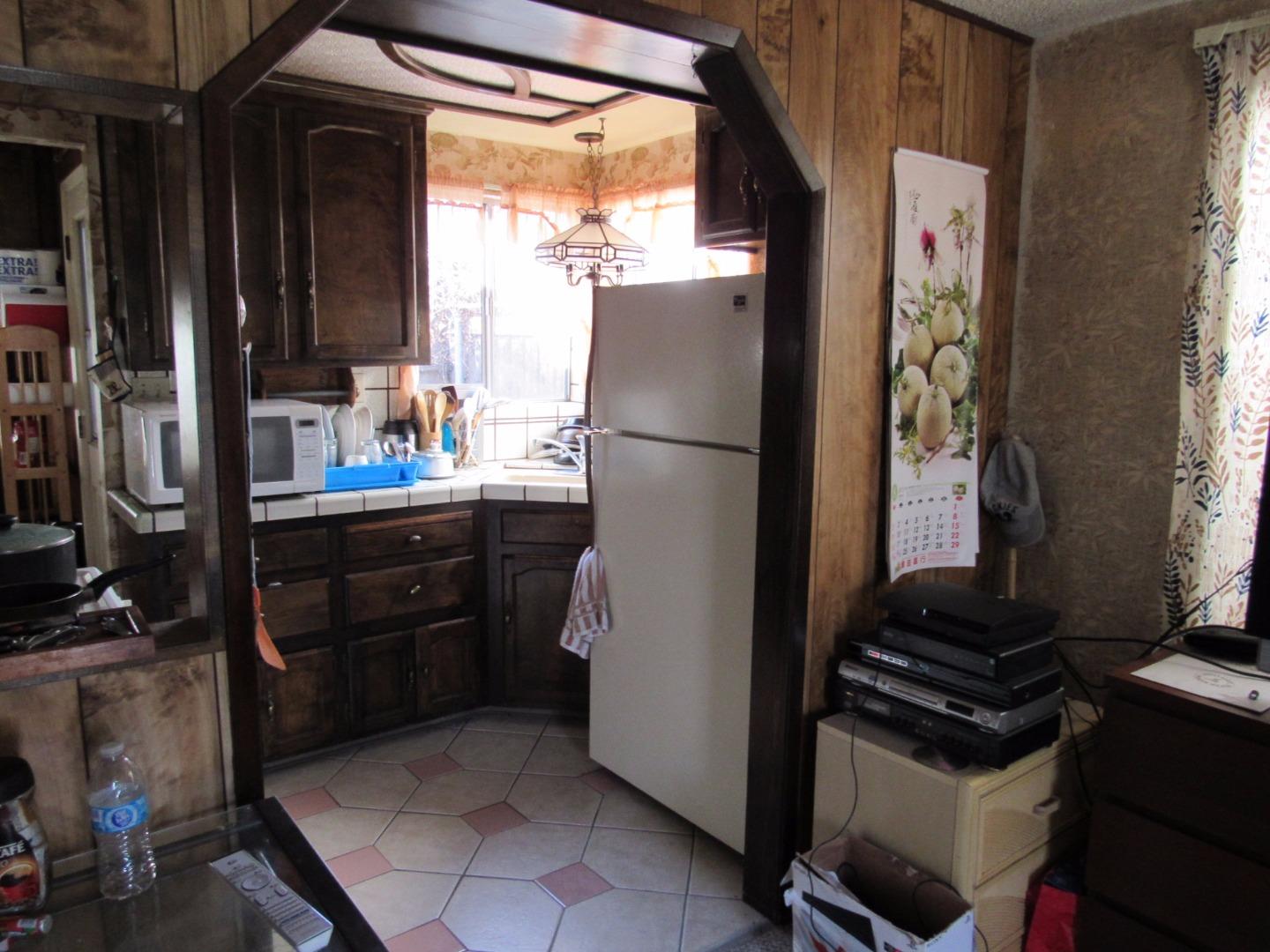 349 Doris Avenue San Jose, CA 95127 - Photo 13 of 23 a kitchen with a refrigerator and a stove