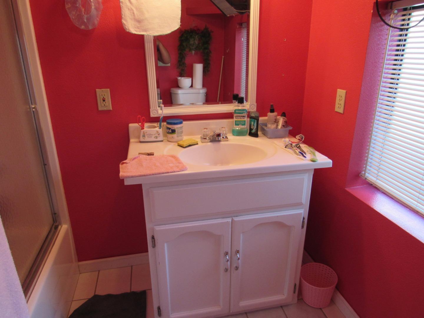 349 Doris Avenue San Jose, CA 95127 - Photo 17 of 23 a bathroom with a sink a toilet and a mirror