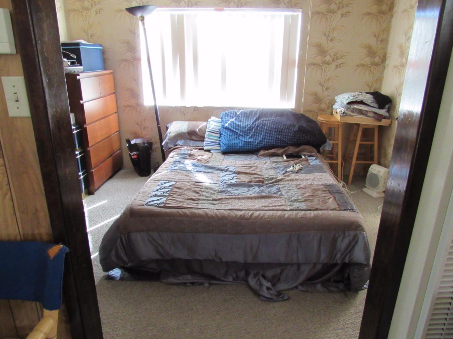 349 Doris Avenue San Jose, CA 95127 - Photo 4 of 23 a bedroom with a bed and a window