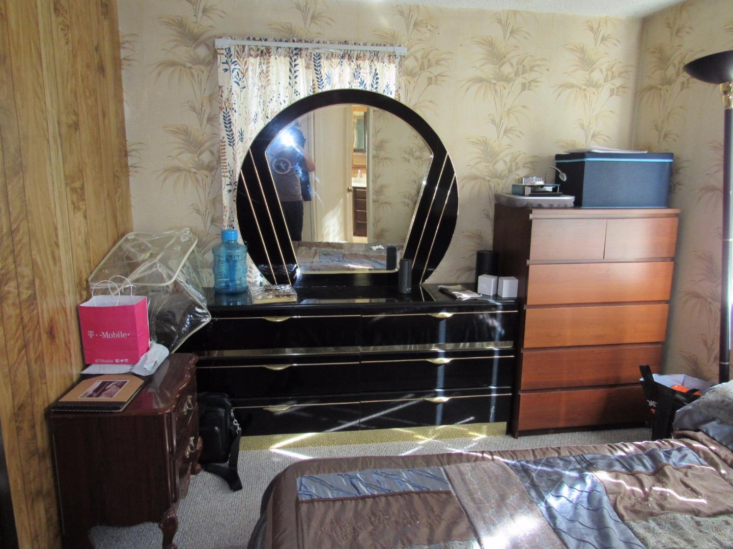349 Doris Avenue San Jose, CA 95127 - Photo 9 of 23 a bedroom with a bed and a machine