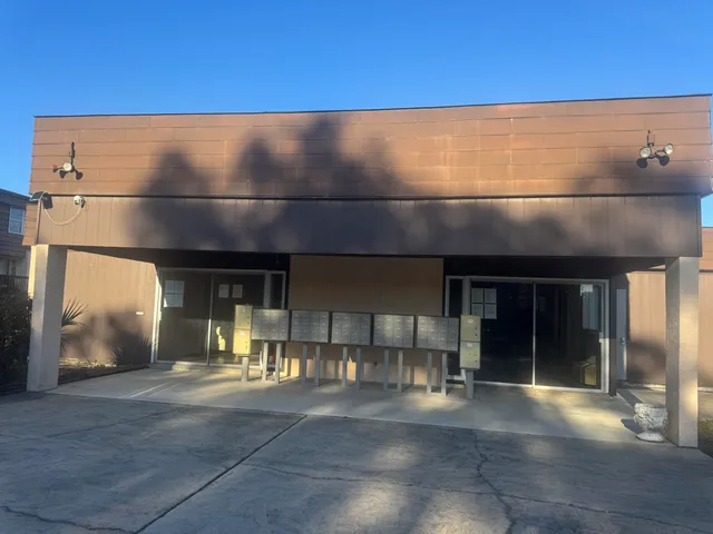 a living room with a couch and a fireplace