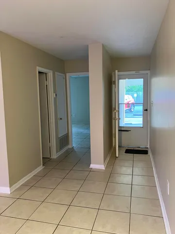 a view of an empty room and window