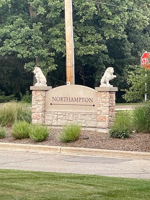 644 Lancaster Drive Pingree Grove, IL 60140 - Photo 12 of 21 a sign on the side of a road