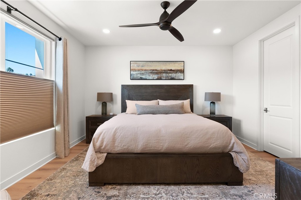 3321 Doheny Way Dana Point, CA 92629 - Photo 17 of 48 a bedroom with a bed and wooden floor