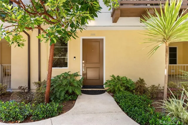 a front view of a house with yard