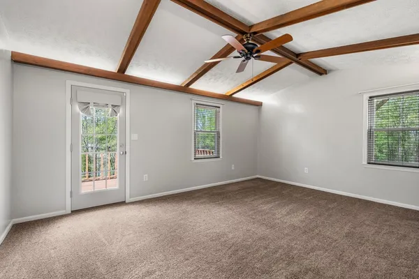 an empty room with windows