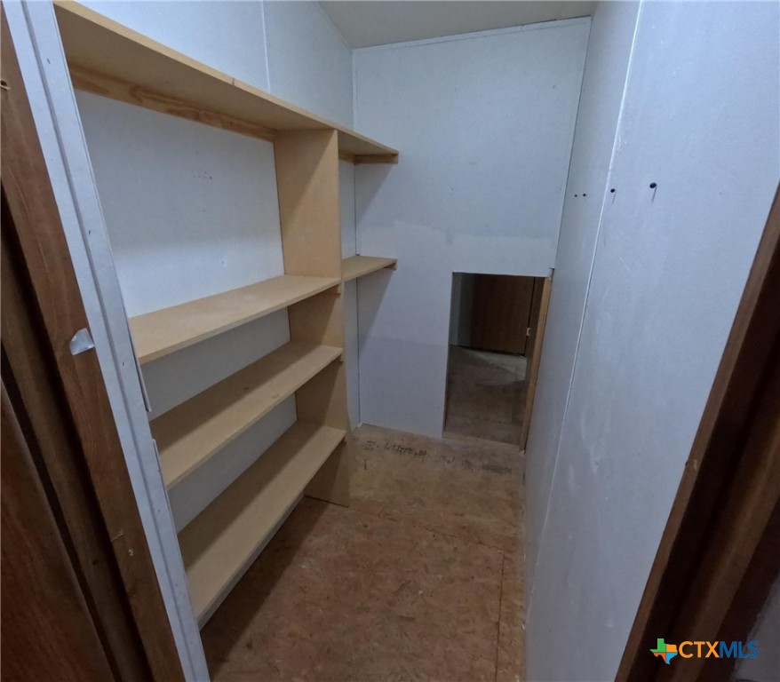 590 Lee Street Victoria, TX 77905 - Photo 14 of 41 a view of an empty walk in closet