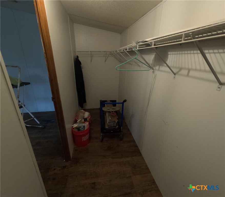 590 Lee Street Victoria, TX 77905 - Photo 31 of 41 a view of walk in closet with clothes and shoes