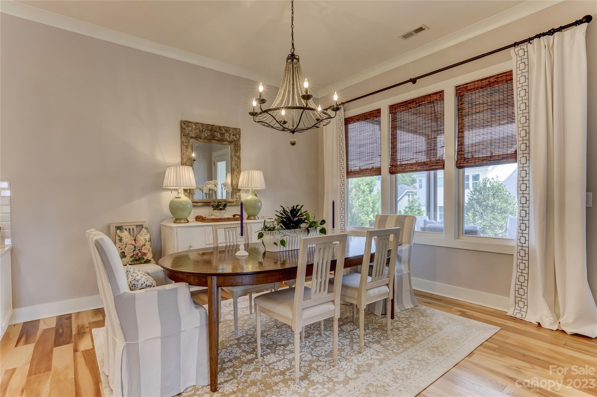 151 Inspired Way Fort Mill, SC 29708 - Photo 17 of 48 a dining room with furniture a chandelier and window