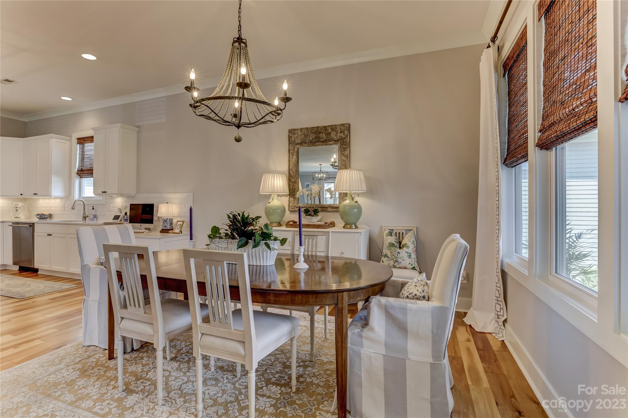 151 Inspired Way Fort Mill, SC 29708 - Photo 18 of 48 a view of a dining room with furniture and a chandelier