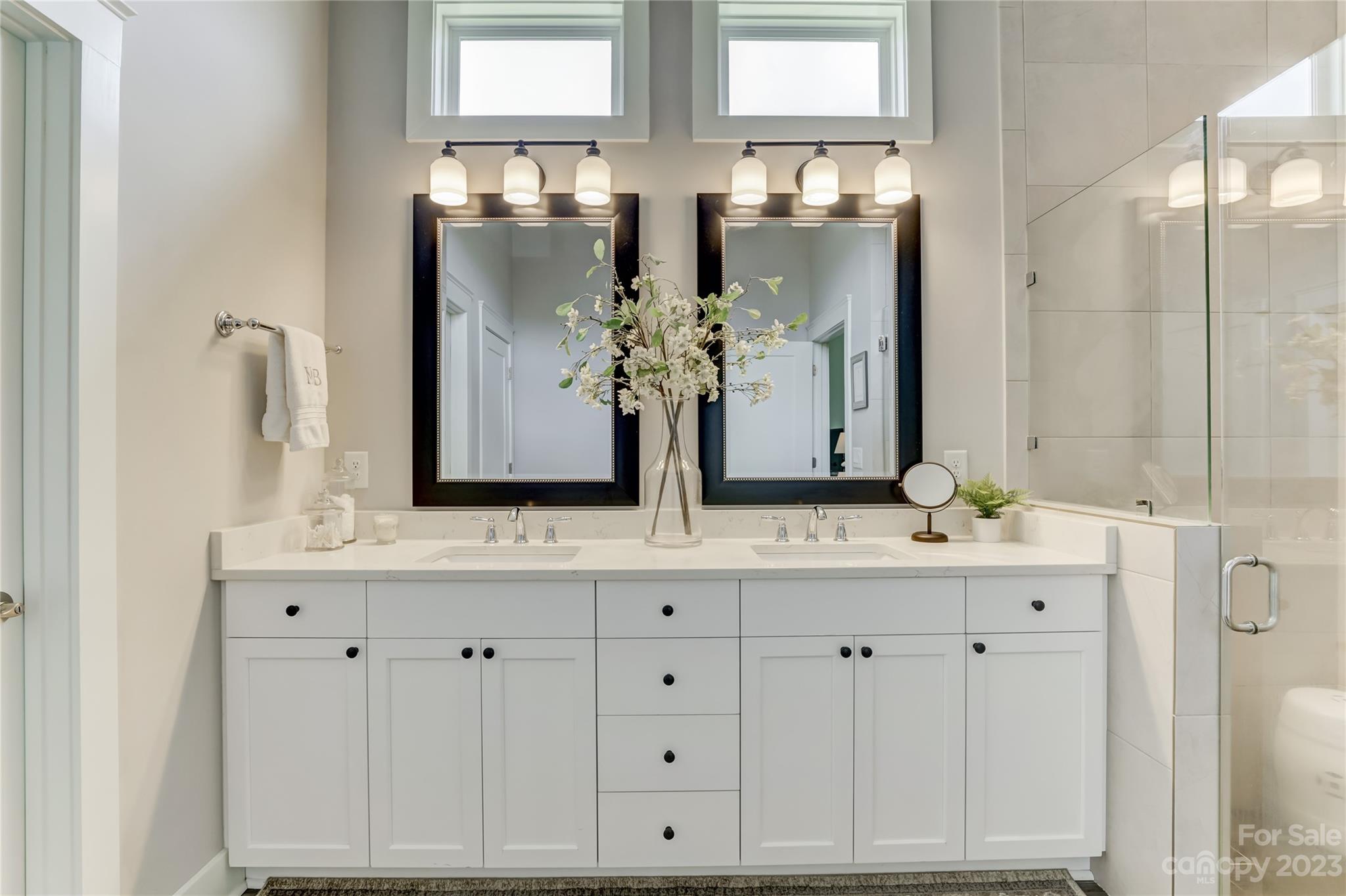 151 Inspired Way Fort Mill, SC 29708 - Photo 27 of 48 a bathroom with a double vanity sink and mirror