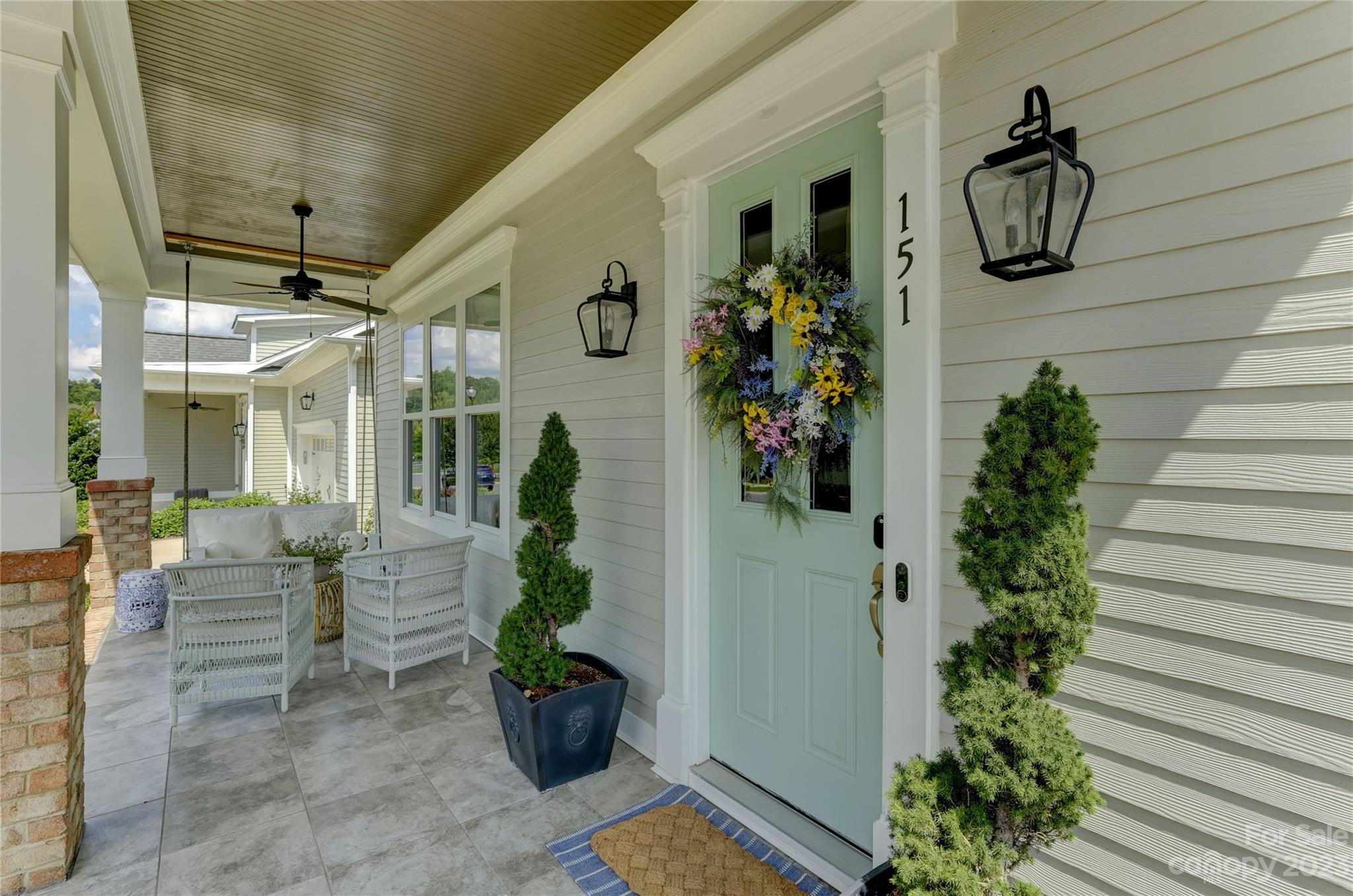 151 Inspired Way Fort Mill, SC 29708 - Photo 4 of 48 a front view of a house with garden
