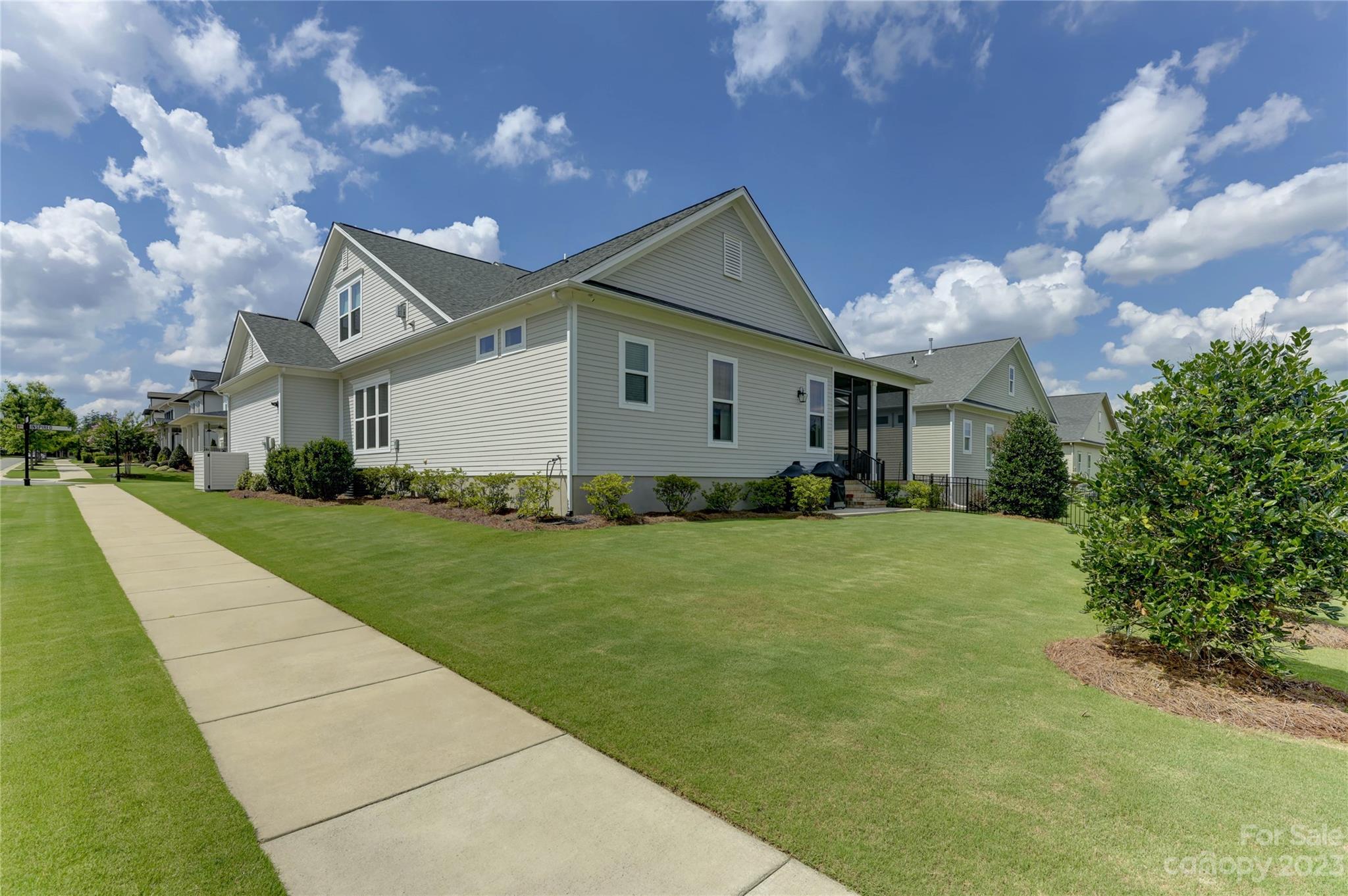 151 Inspired Way Fort Mill, SC 29708 - Photo 45 of 48 a front view of house with yard and green space