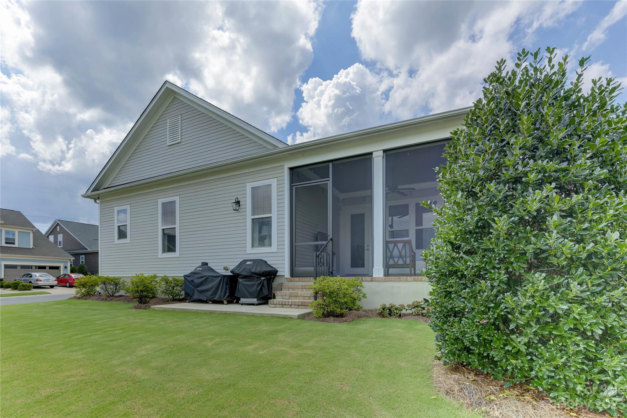151 Inspired Way Fort Mill, SC 29708 - Photo 47 of 48 a front view of house with yard and green space