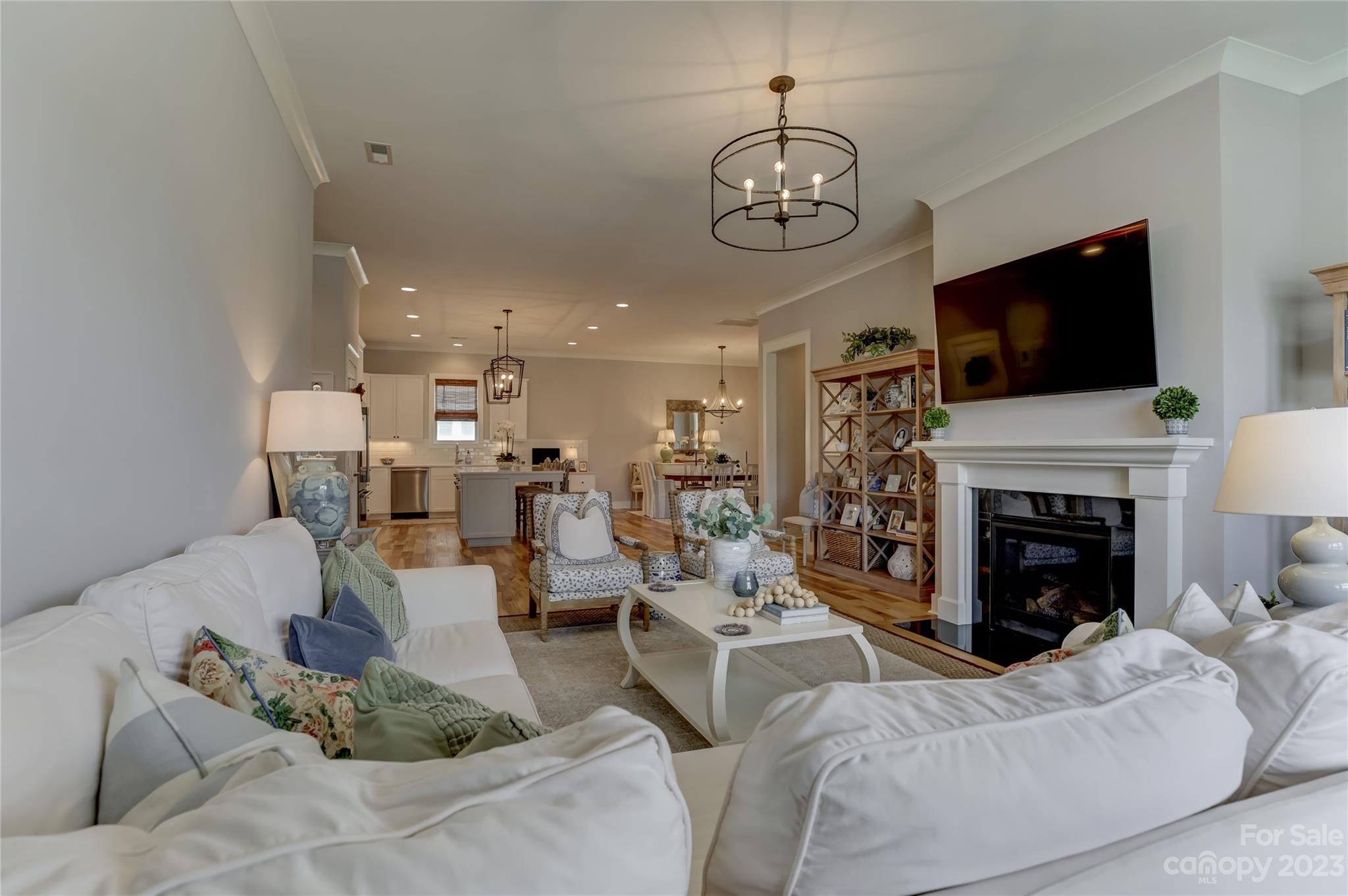 151 Inspired Way Fort Mill, SC 29708 - Photo 9 of 48 a living room with furniture a fireplace and flat screen tv