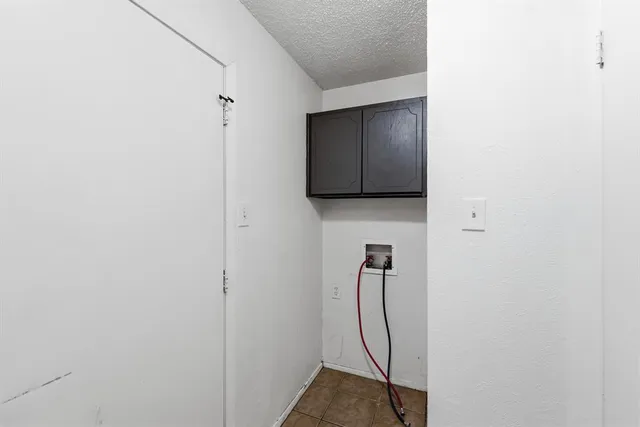 a view of house with swimming pool outdoor seating