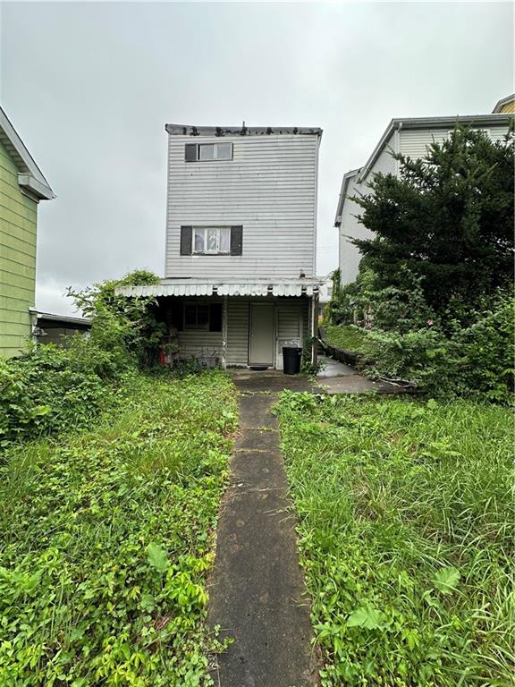 2118 Elsie Street Pittsburgh, PA 15210 - Photo 2 of 12 a view of a pathway with a house