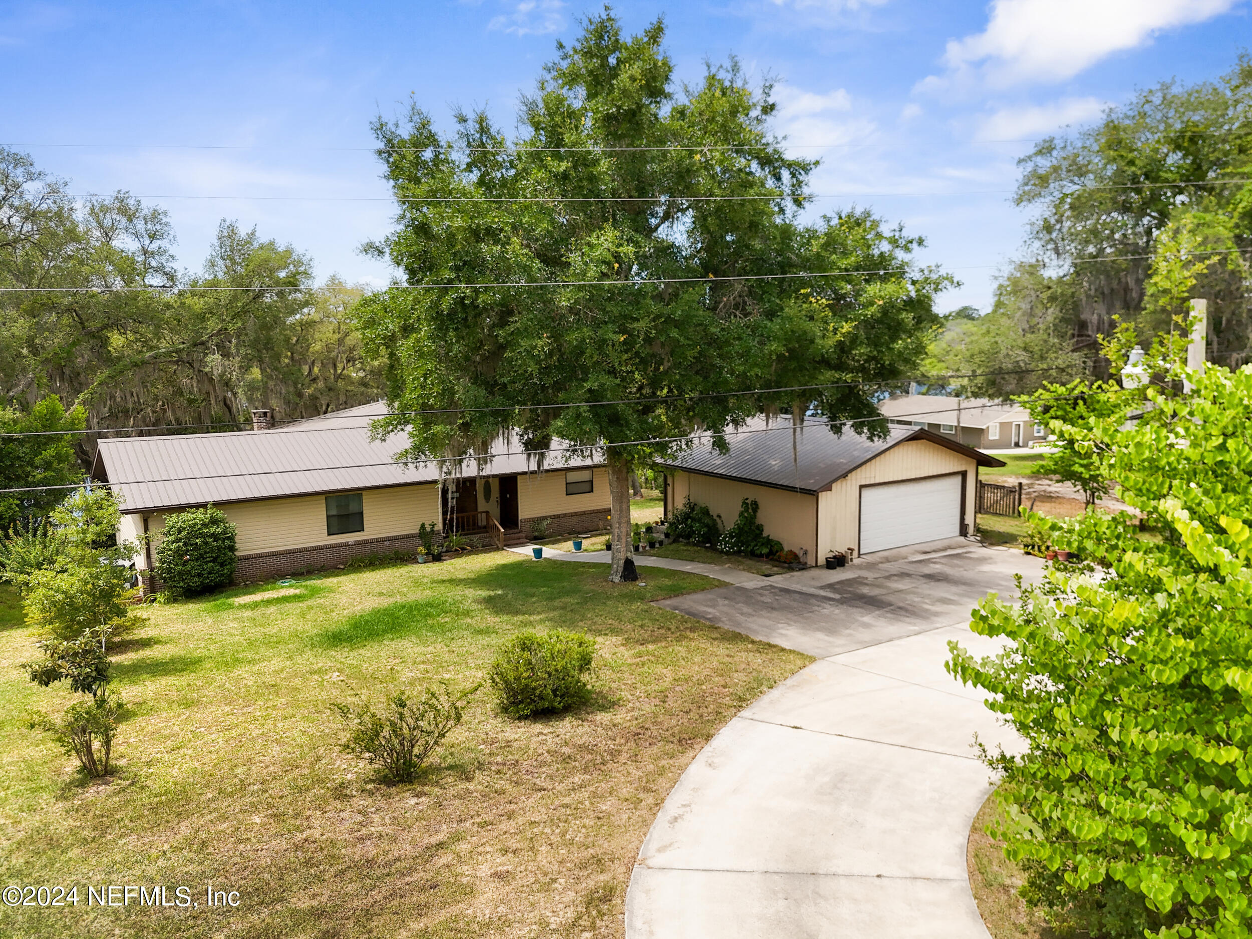 7079 Immokalee Road Keystone Heights, FL 32656 - Photo 3 of 48 43_dji_20240604115933_0846_d