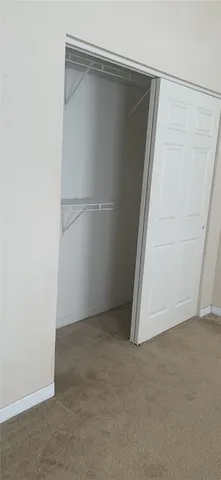 an empty room with closet
