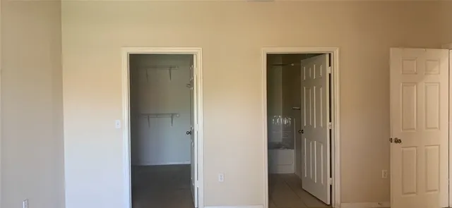 a view of a hallway with closet