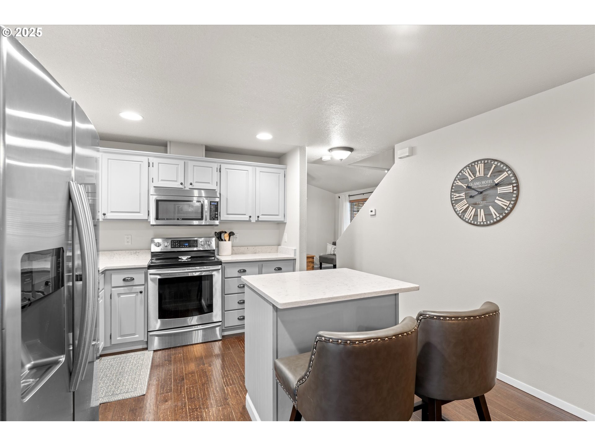 3019 Brooke Street Forest Grove, OR 97116 - Photo 13 of 34 a kitchen with stainless steel appliances a refrigerator stove and microwave